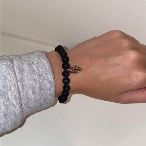 Black lava rock and hand bracelet